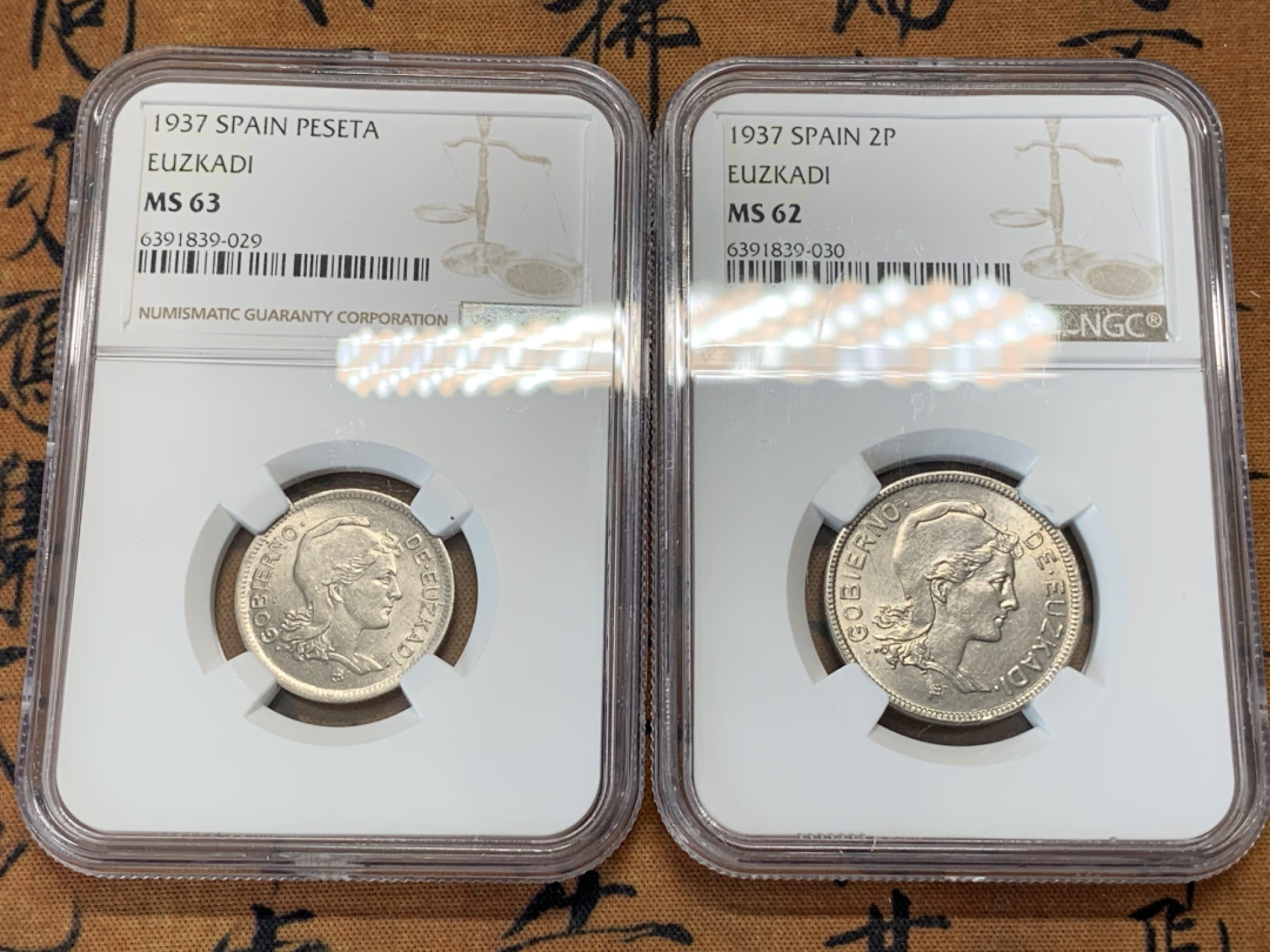 《竞宝斋》第93场-本周日，周一2场连拍（全场不限金额包邮） NGC MS62-63 西班牙内战 尤兹卡迪1937年1，2比塞塔一对