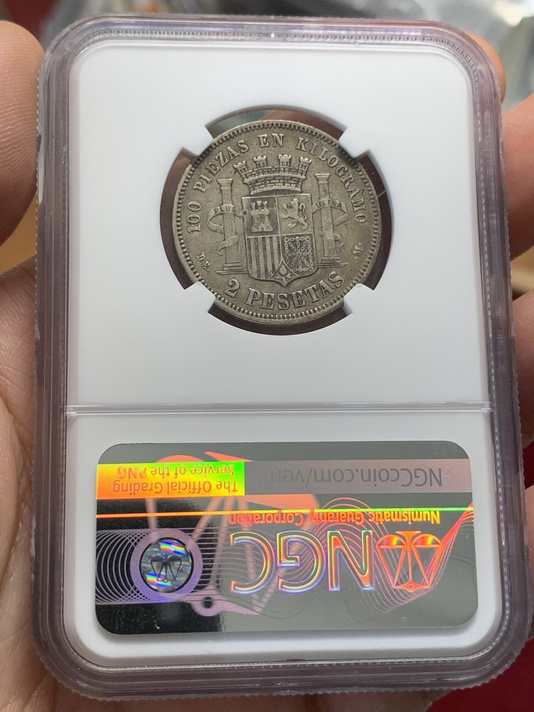 《竞宝斋》第93场-本周日，周一2场连拍（全场不限金额包邮） NGC-XF40 西班牙 1870年 坐人拿花 2比塞塔 银币 老包浆  出分数量稀少