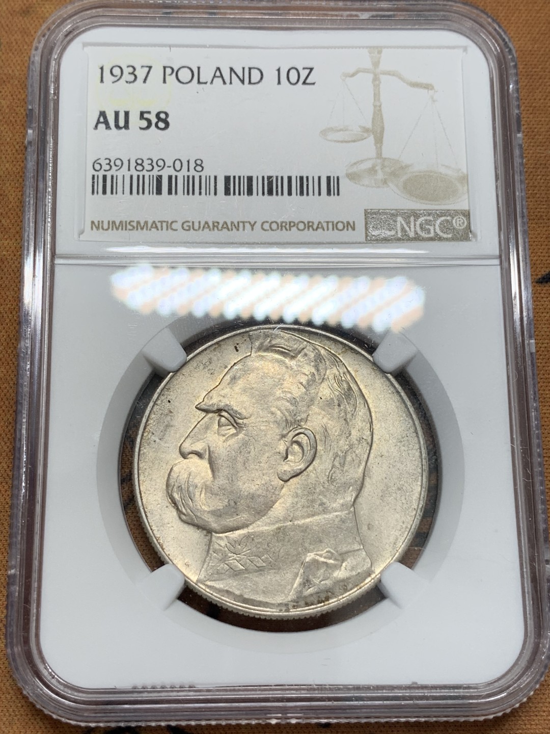 《竞宝斋》第93场-本周日，周一2场连拍（全场不限金额包邮） NGC AU58 波兰第二共和国1937年10兹罗提大银币 背面状态极好，可惜正面有磨损，给了58，该品种通货常见，好品少见