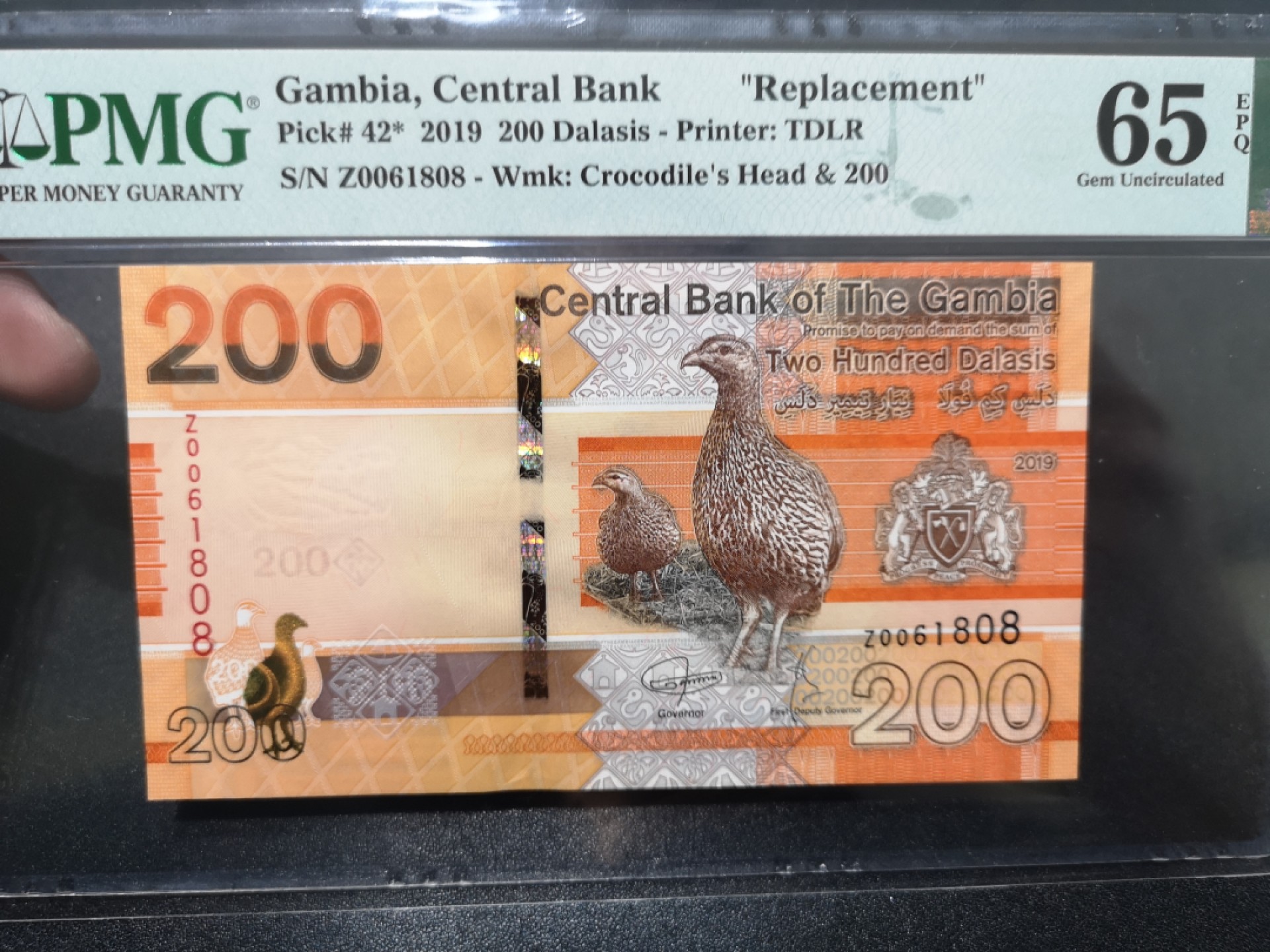 《外钞收藏家》第二百零一期 2019年甘比亚 200 PMG65 无47尾8 补号