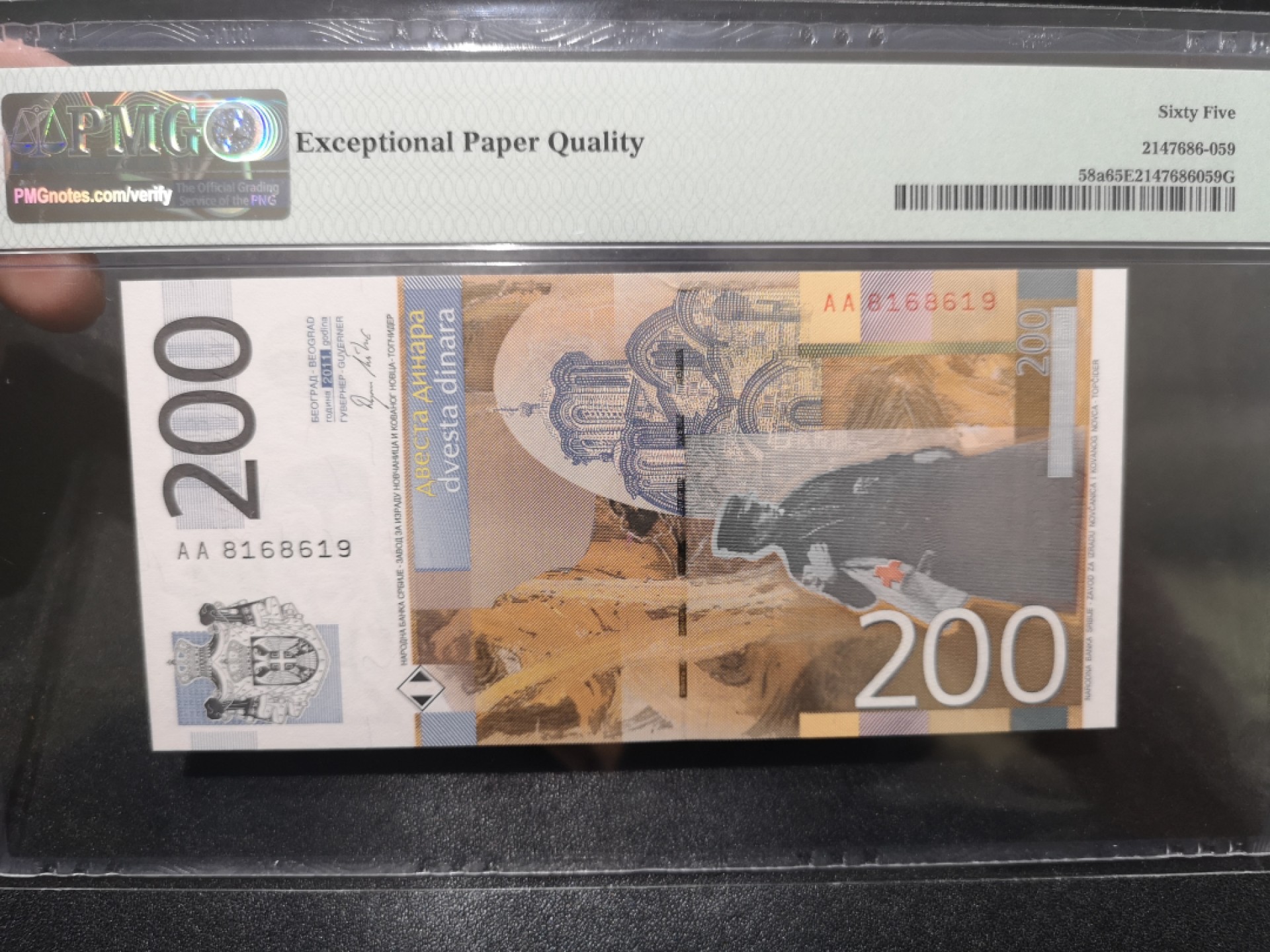 《外钞收藏家》第二百零一期 2011年塞尔维亚200第纳尔 PMG65 无47 AA冠