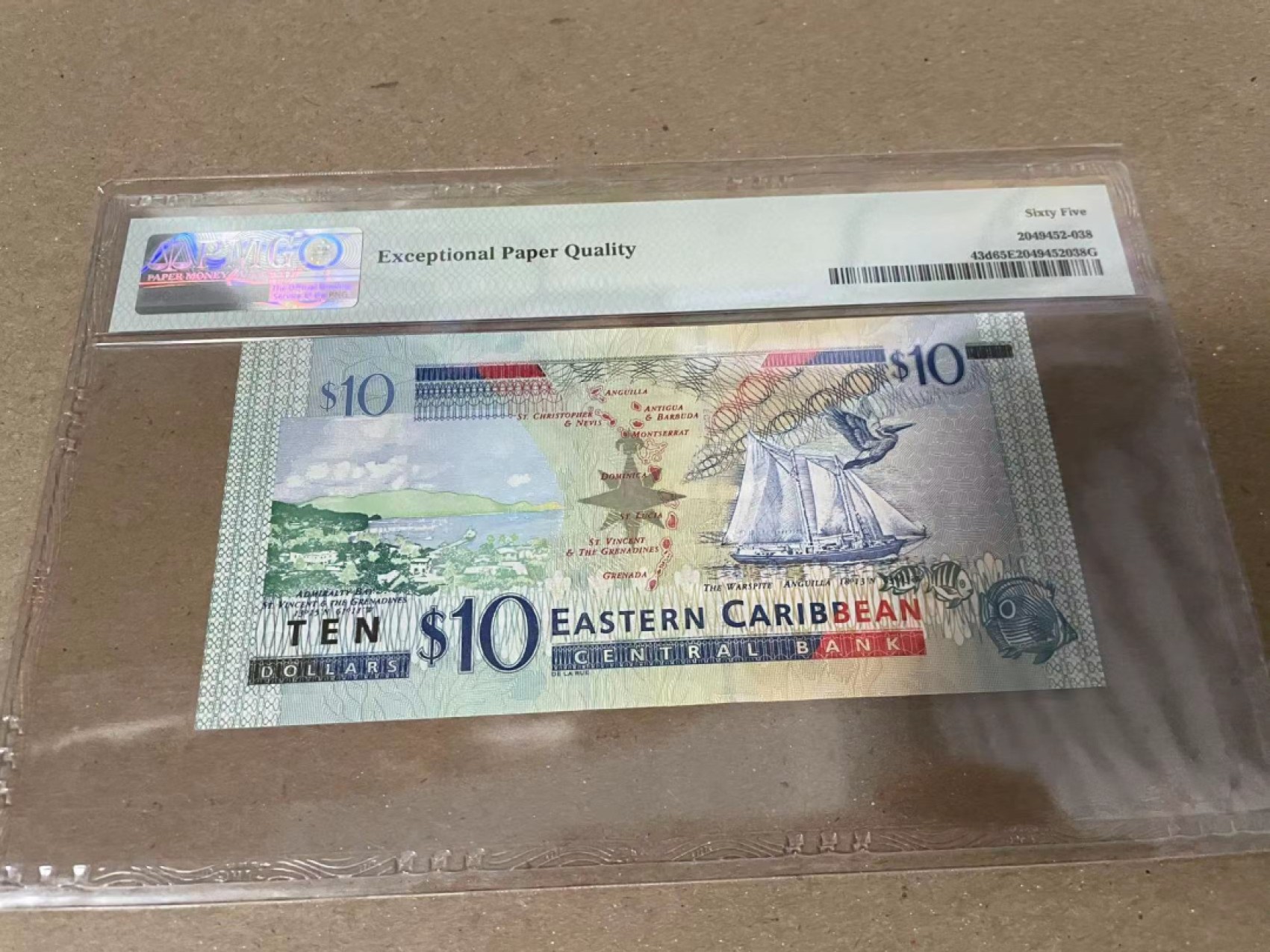 【Blue Auction】✨世界纸币精拍第222期 ——冠军舍那 东加勒比 2003年10元 PMG65EPQ 女王