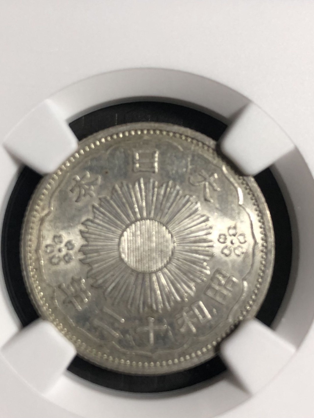 NGC评级61分双凤银币