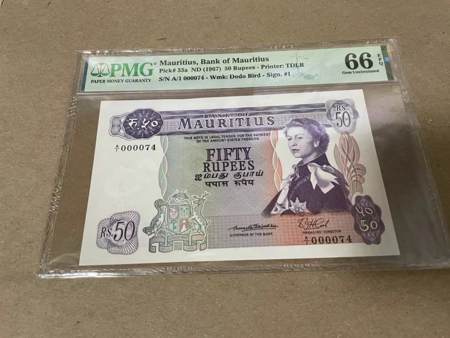 【Blue Auction】✨世界纸币精拍第222期 ——冠军舍那 【A1首发74小号】毛里求斯 1967年50卢比 最高值 PMG66EPQ 戎装女王