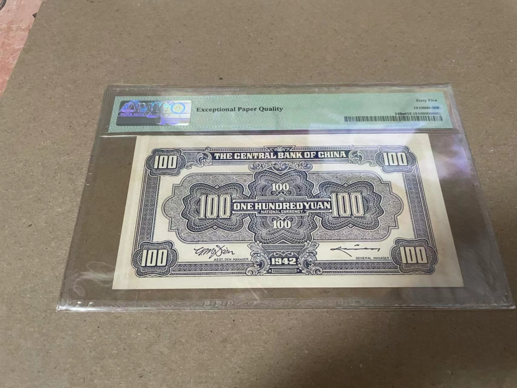 【Blue Auction】✨世界纸币精拍第222期 ——冠军舍那 民国 中央银行 1942年100元 红牌坊 PMG65EPQ 绝品