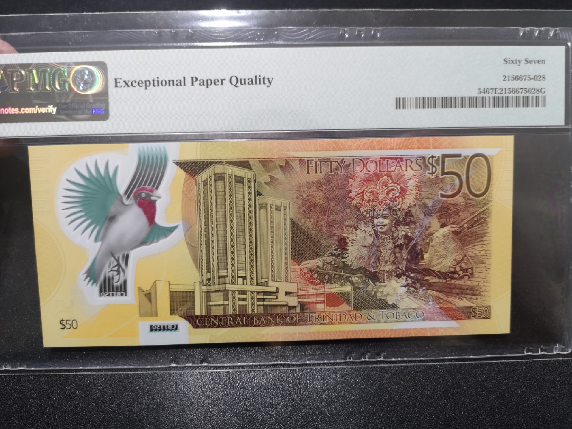 《外钞收藏家》第二百零一期 2014年特里达尼亚和多巴哥50刀 PMG67 纪念钞