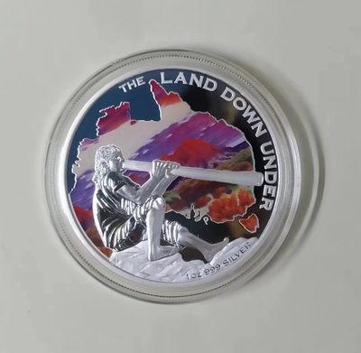 【海寧潮】拍卖第四十期 - 【海寧潮客户代拍】澳大利亚 2013，“霞光下的吹箫人”，1盎司彩色精制银币.(澳洲箫-澳洲土著乐器迪吉里杜管),非常漂亮银币,盒证全