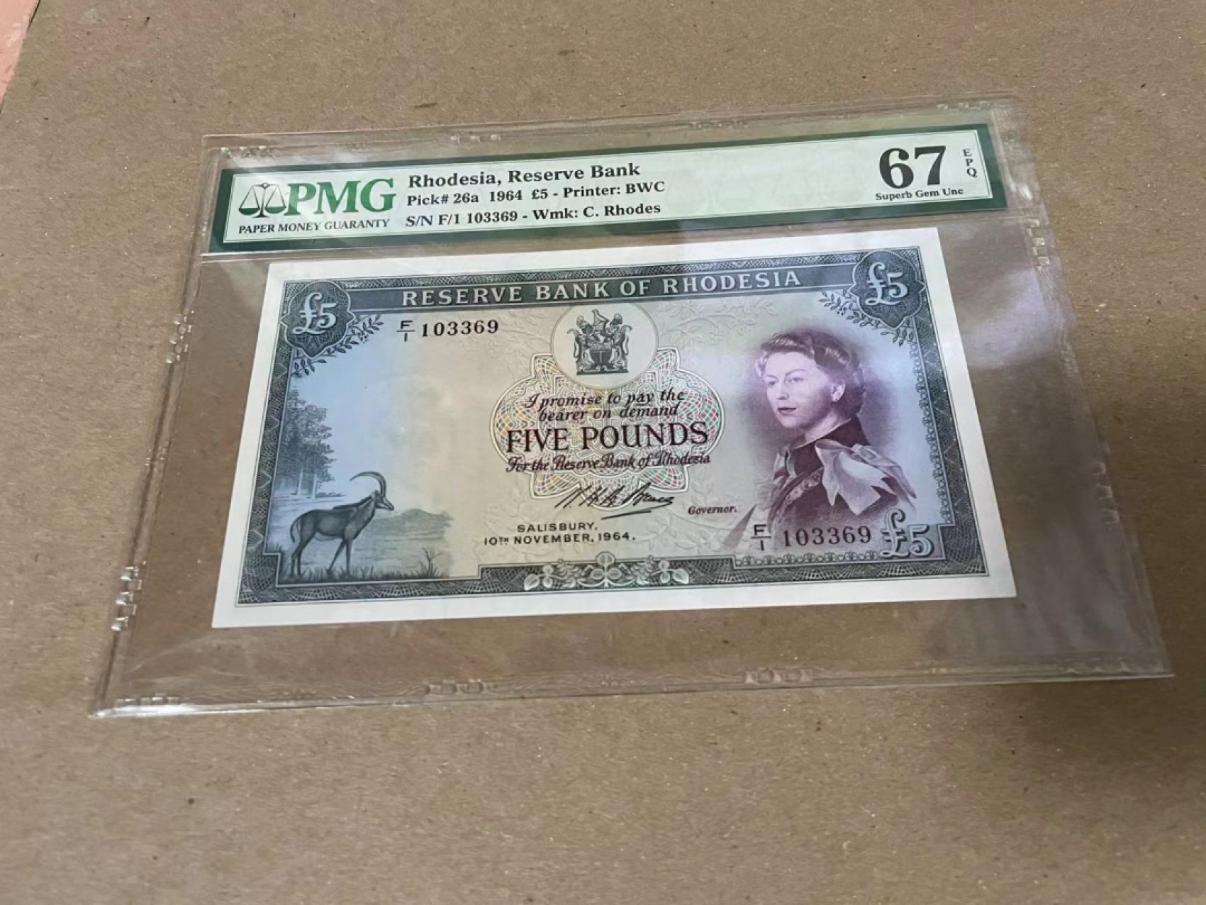 【Blue Auction】✨世界纸币精拍第222期 ——冠军舍那 【无47】罗德西亚 1964年5镑 戎装女王 PMG67EPQ 高分 BWC出品 双面雕刻 精美 大津巴布韦遗址