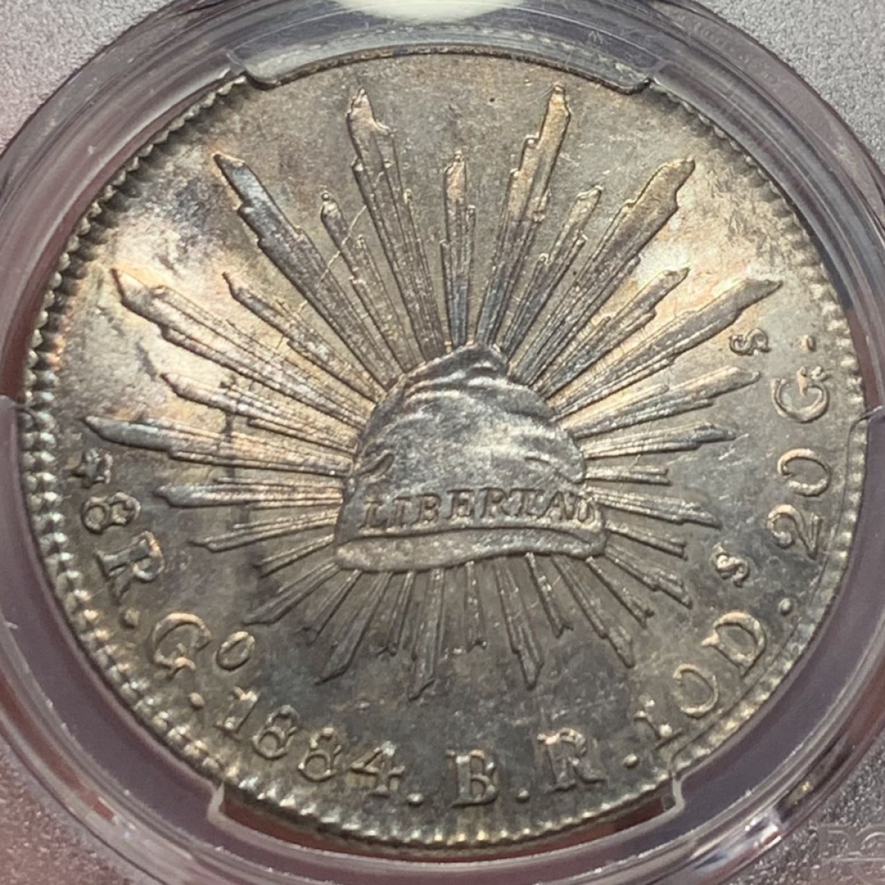 紫瑗钱币——第206期拍卖 墨西哥 1884年 GO BR 在华流通 花边鹰洋 8里亚尔 银币 PCGS MS64 五彩包浆