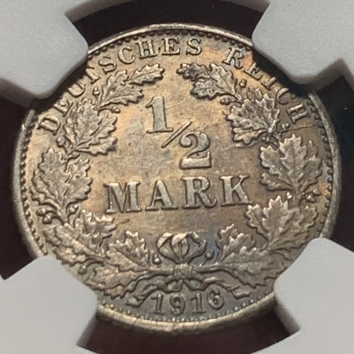 紫瑗钱币——第207期拍卖 德国 1916年 G版 第二帝国 1/2马克 银币 NGC MS62 五彩包浆
