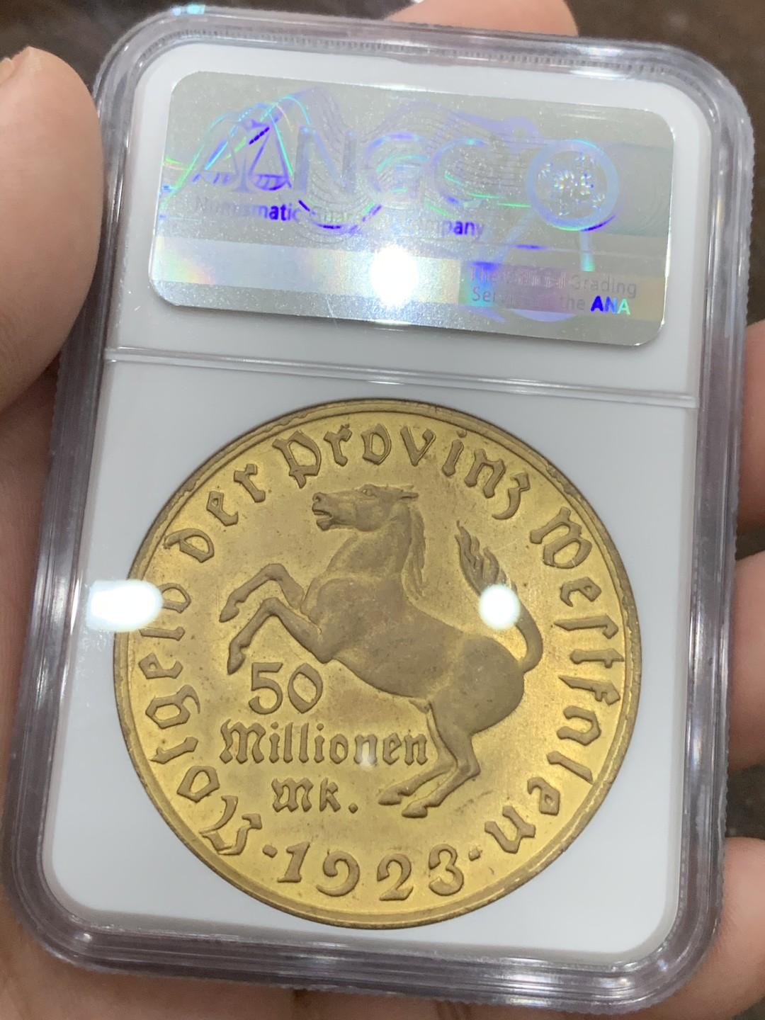 《竞宝斋》第95场-本周日，周一，周四，3场连拍（全场不限金额包邮） NGC-MS65 5000万马克！德国威斯特伐利亚1923年5000万马克马币镀金币，厚重压手，金光闪闪，少见高分！