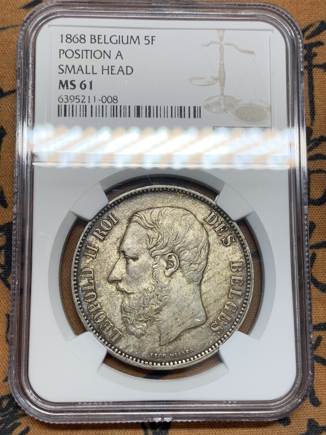 《竞宝斋》第95场-本周日，周一，周四，3场连拍（全场不限金额包邮） NGC-MS61 比利时1868年 利奥波德二世小头版 5法郎 浓烈的酱彩包浆能出分真的是非常难得 而且还是好版