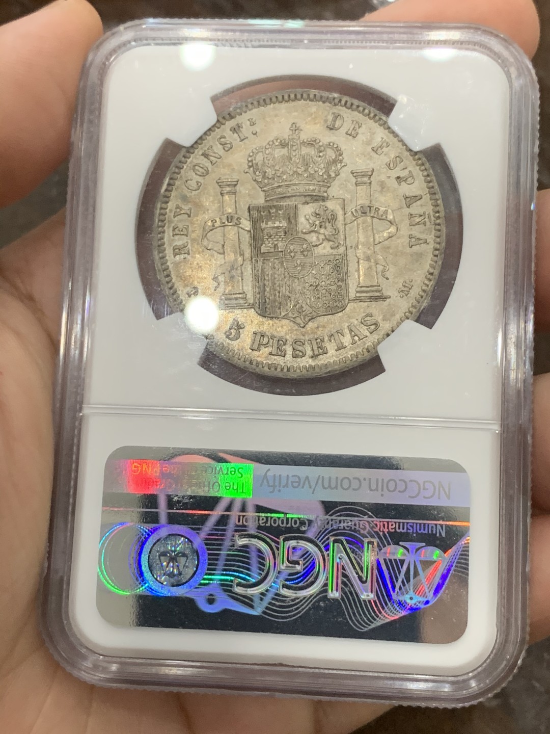 《竞宝斋》第95场-本周日，周一，周四，3场连拍（全场不限金额包邮） 季军分 NGC-AU58 西班牙阿方索十三世双柱5比塞塔 1890（90）PGM 传世老包浆灰金彩 背面有镜面感 上面只有2枚MS 