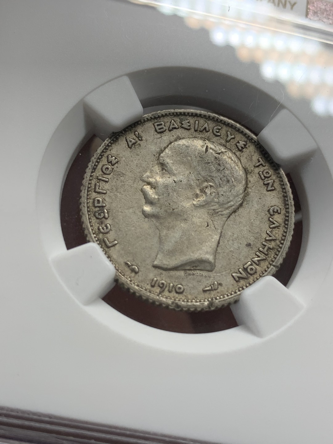 《竞宝斋》第95场-本周日，周一，周四，3场连拍（全场不限金额包邮） NGC-AUD 希腊1910年1德拉克马 经典设计 海神 老包浆带原光味道一流 边小磕碰严评