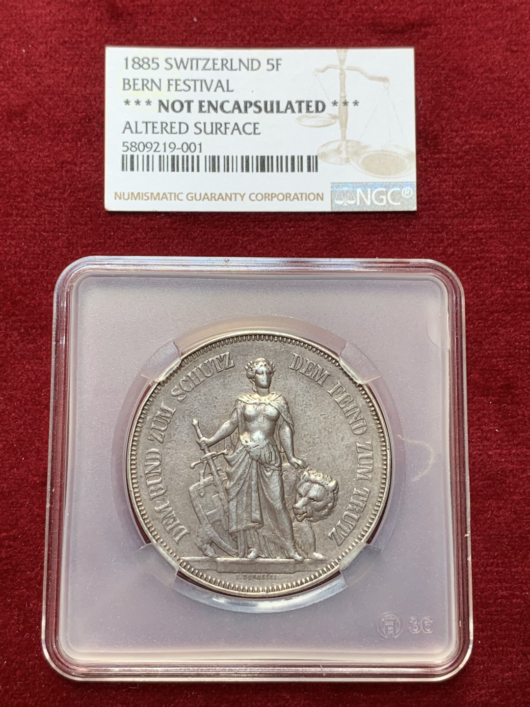 《竞宝斋》第95场-本周日，周一，周四，3场连拍（全场不限金额包邮） 1885年瑞士狩猎节5法郎银币 做过吊坠 币面有些腐蚀 NGC给了“改变外表”的标签