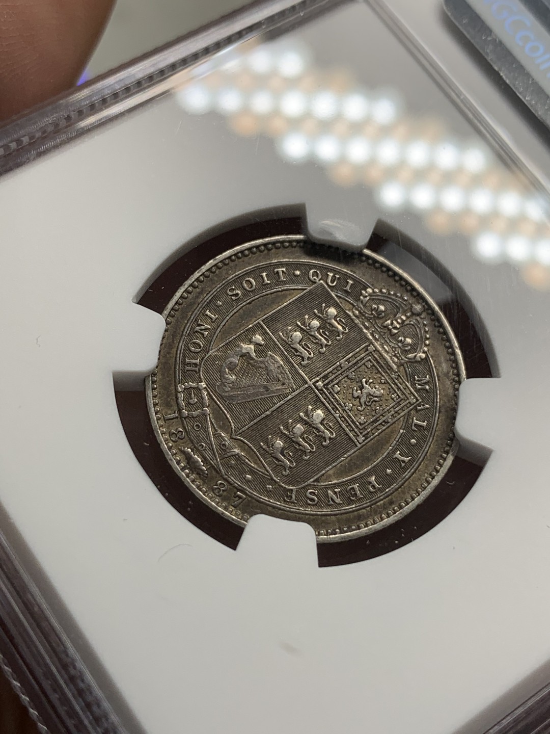 《竞宝斋》第95场-本周日，周一，周四，3场连拍（全场不限金额包邮） NGC-XFD 英国维多利亚 1887年1先令 银币 包浆非常的漂亮