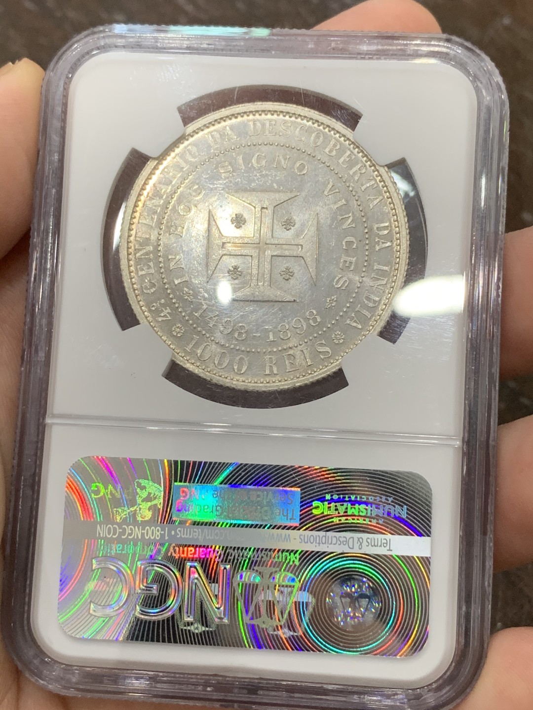 《竞宝斋》第95场-本周日，周一，周四，3场连拍（全场不限金额包邮） NGC-MS63+ 葡萄牙1898年 发现印度纪念 双人头 1000R大银币 曝光好品