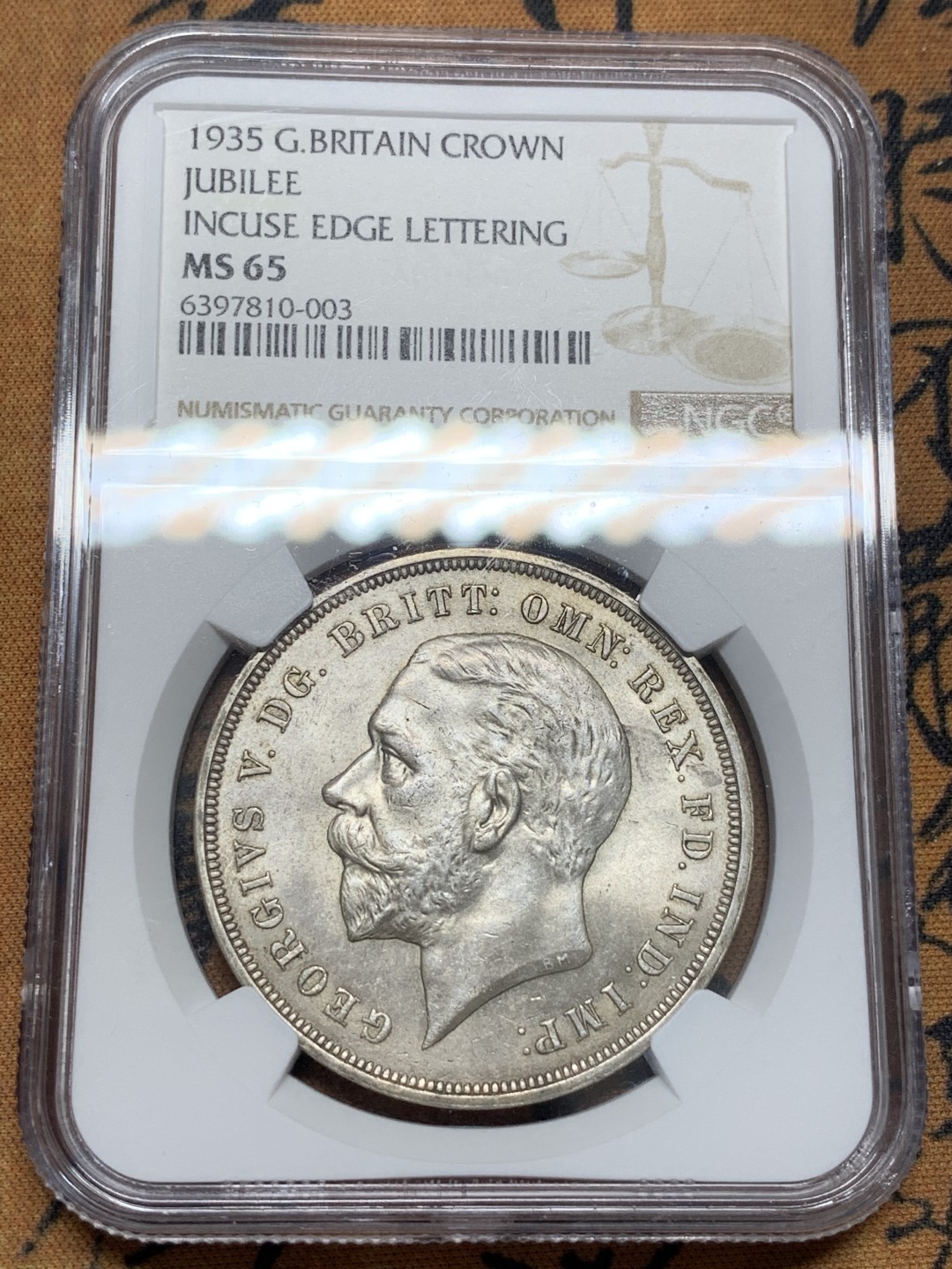 《竞宝斋》第95场-本周日，周一，周四，3场连拍（全场不限金额包邮） NGC-MS65 1935年英国乔治五世木马剑银币 铁灰色包浆，高分热门品种