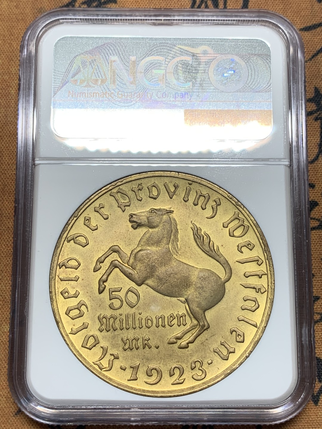 《竞宝斋》第95场-本周日，周一，周四，3场连拍（全场不限金额包邮） NGC-MS65 5000万马克！德国威斯特伐利亚1923年5000万马克马币镀金币，厚重压手，金光闪闪，少见高分！