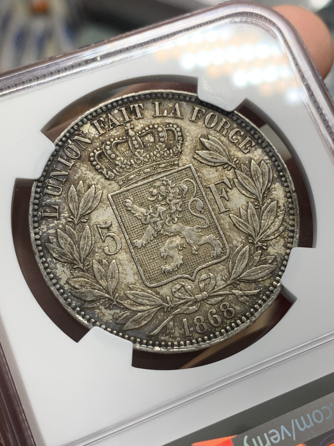 《竞宝斋》第95场-本周日，周一，周四，3场连拍（全场不限金额包邮） NGC-MS61 比利时1868年 利奥波德二世小头版 5法郎 浓烈的酱彩包浆能出分真的是非常难得 而且还是好版