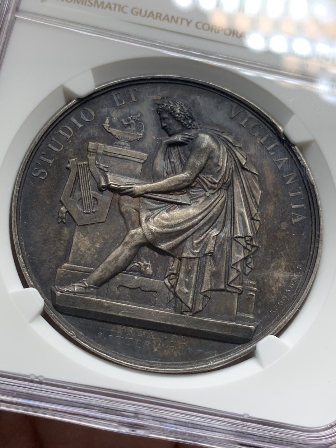 《竞宝斋》第95场-本周日，周一，周四，3场连拍（全场不限金额包邮） NGC-MS62 瑞士1850音乐学院银章 深彩包浆 刻画细腻