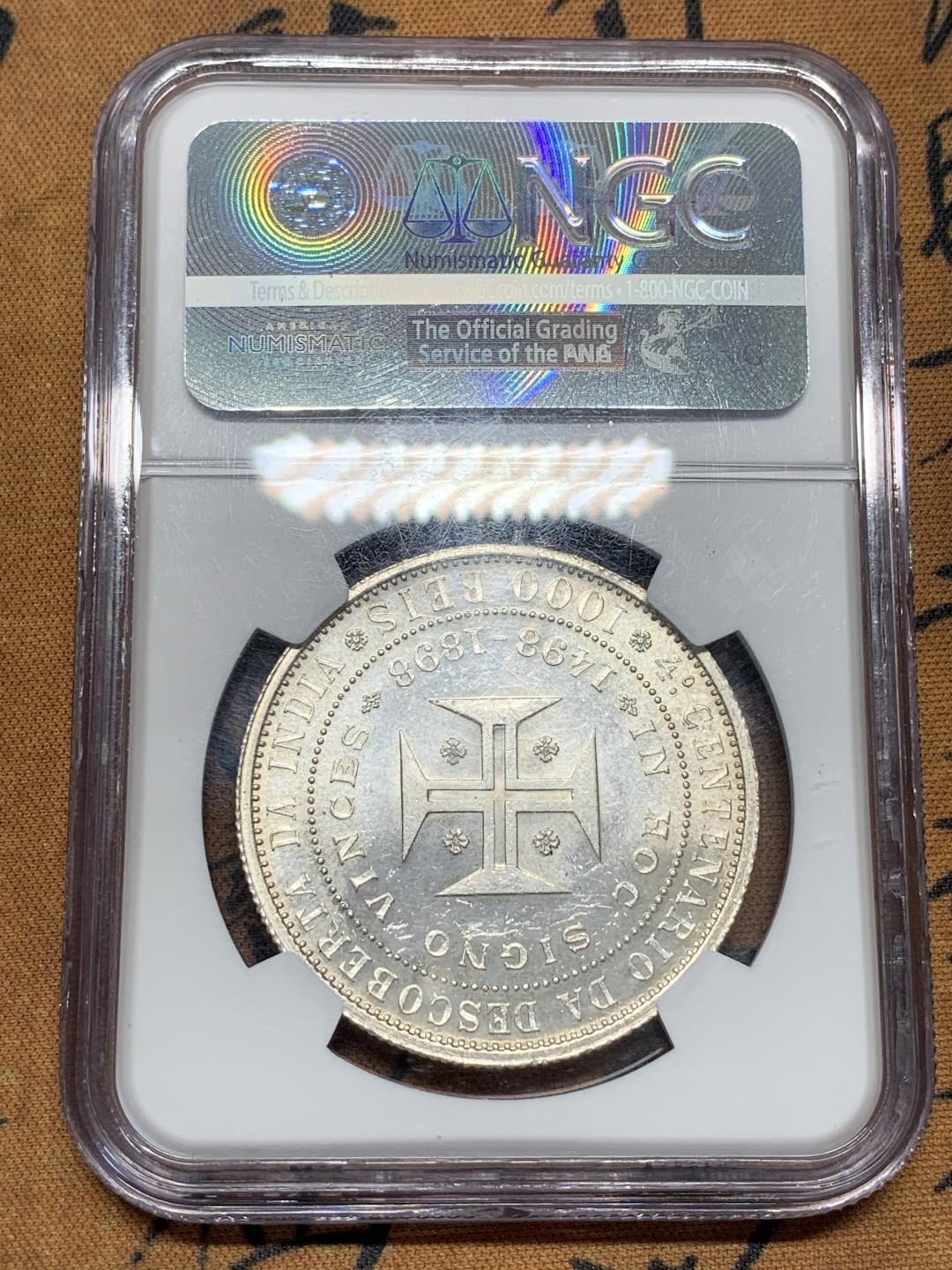 《竞宝斋》第95场-本周日，周一，周四，3场连拍（全场不限金额包邮） NGC-MS63+ 葡萄牙1898年 发现印度纪念 双人头 1000R大银币 曝光好品