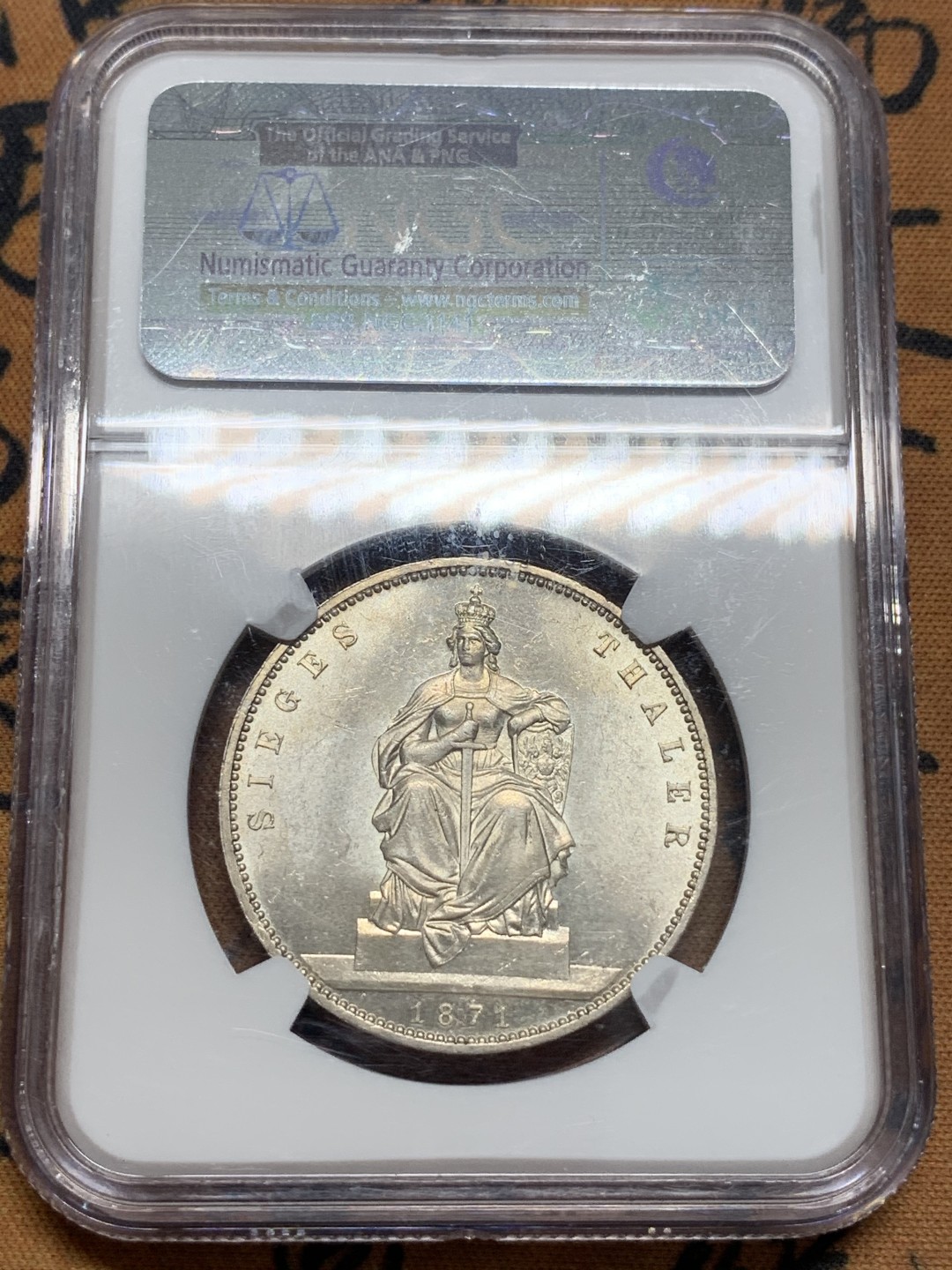 《竞宝斋》第95场-本周日，周一，周四，3场连拍（全场不限金额包邮） NGC-MS64，德国 普鲁士1871年普法胜利1泰勒，NGC老盒车轮光，品种普通状态一流。