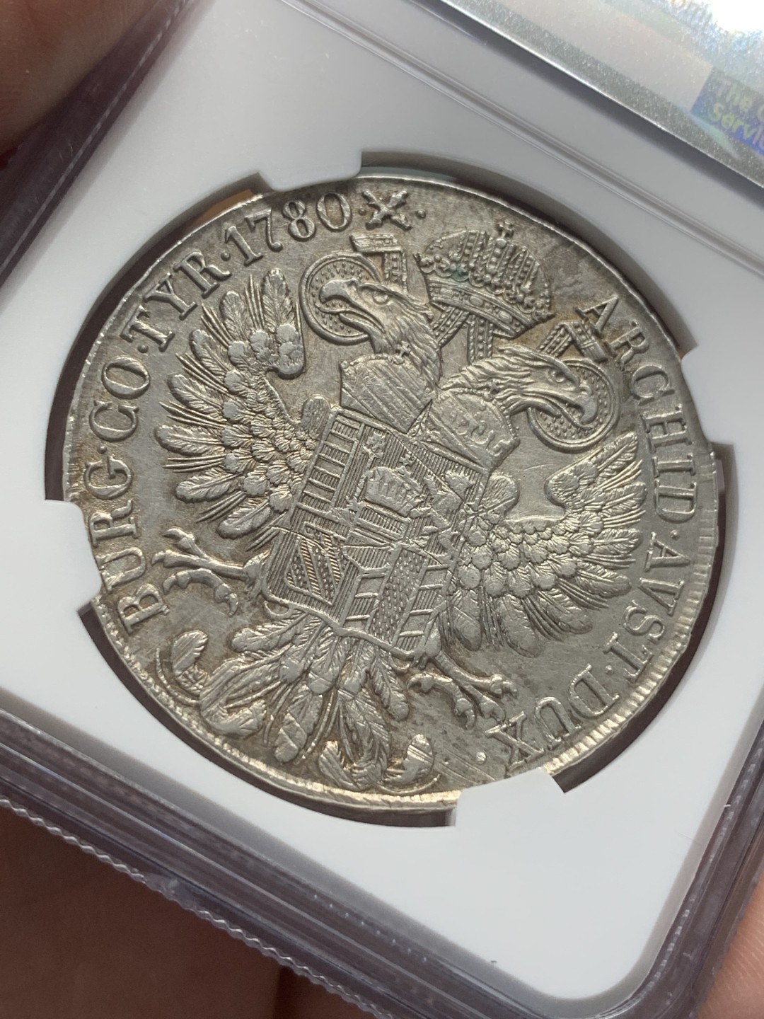 《竞宝斋》第95场-本周日，周一，周四，3场连拍（全场不限金额包邮） NGC-AUD 奥地利“1780年”特蕾莎1泰勒银币 1815-1830年铸造 对应目录编号应该是36a