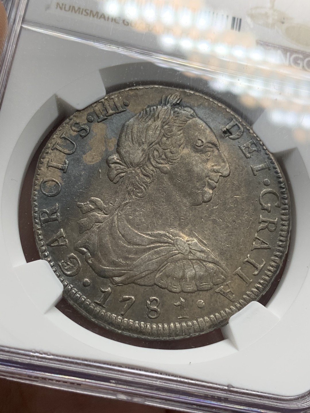 《竞宝斋》第95场-本周日，周一，周四，3场连拍（全场不限金额包邮） NGC XF  玻利维亚 1781年 卡三 8里亚尔 双柱 大银币  双面 深打带包浆 有小戳 味道不错