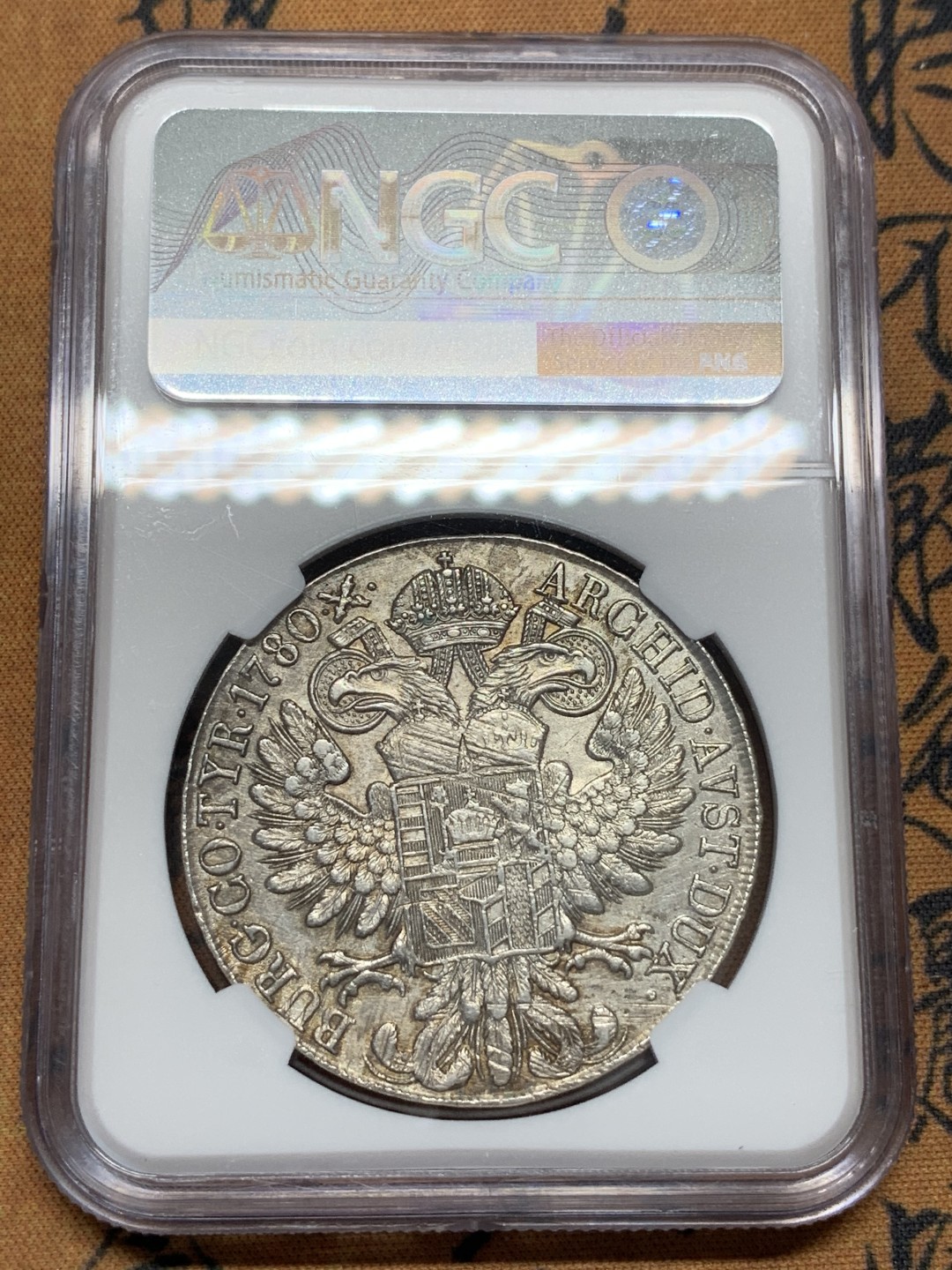 《竞宝斋》第95场-本周日，周一，周四，3场连拍（全场不限金额包邮） NGC-AUD 奥地利“1780年”特蕾莎1泰勒银币 1815-1830年铸造 对应目录编号应该是36a