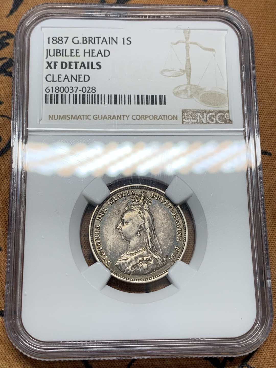 《竞宝斋》第95场-本周日，周一，周四，3场连拍（全场不限金额包邮） NGC-XFD 英国维多利亚 1887年1先令 银币 包浆非常的漂亮