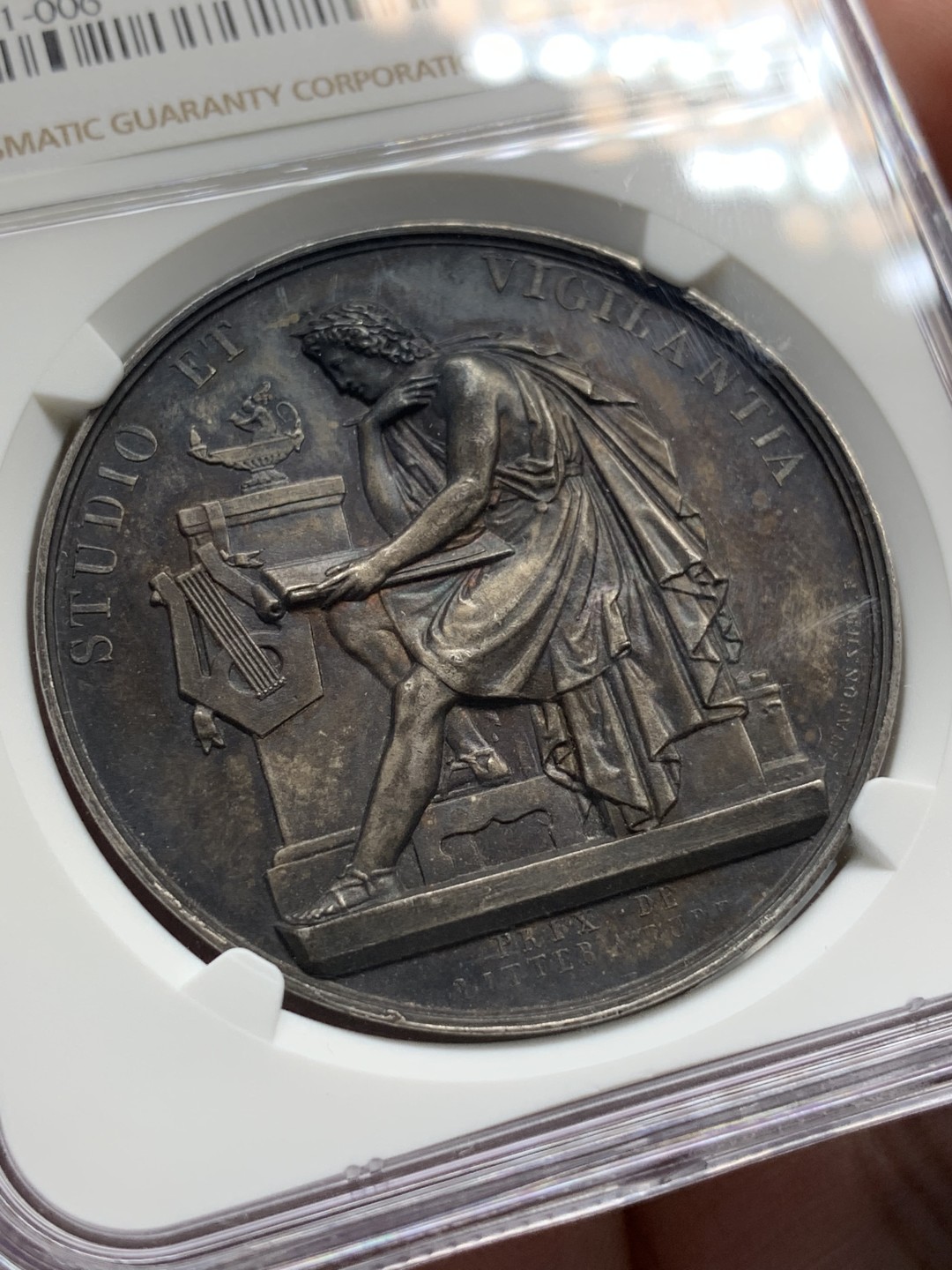 《竞宝斋》第95场-本周日，周一，周四，3场连拍（全场不限金额包邮） NGC-MS62 瑞士1850音乐学院银章 深彩包浆 刻画细腻