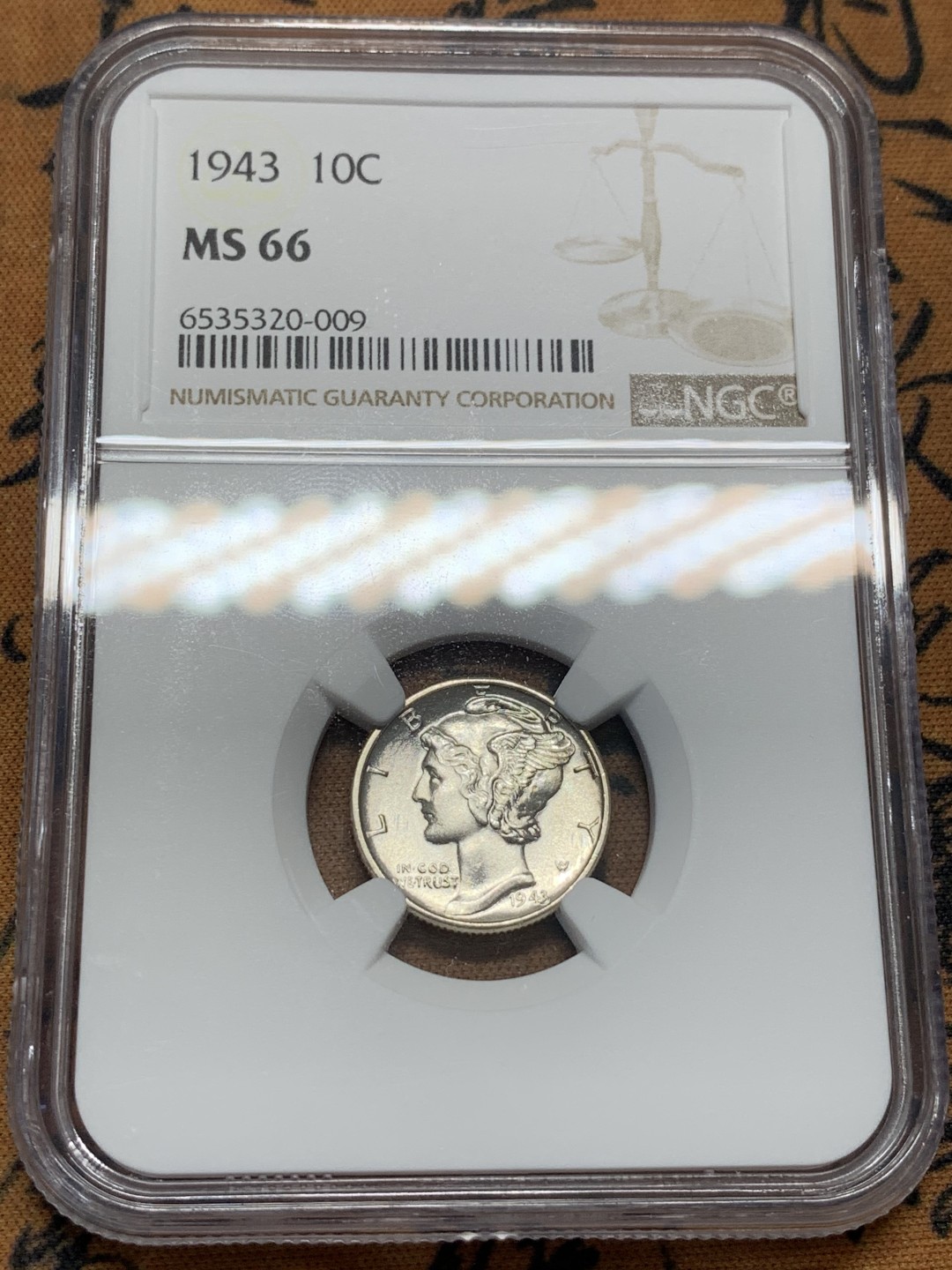 《竞宝斋》第95场-本周日，周一，周四，3场连拍（全场不限金额包邮） NGC-MS66 美国 1943年 10美分 小飞侠墨丘利 银币