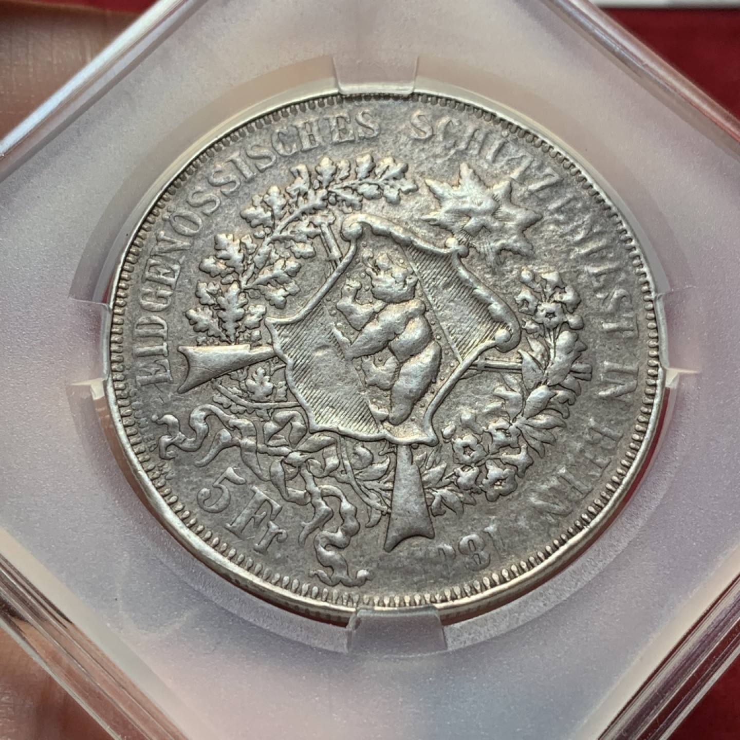 《竞宝斋》第95场-本周日，周一，周四，3场连拍（全场不限金额包邮） 1885年瑞士狩猎节5法郎银币 做过吊坠 币面有些腐蚀 NGC给了“改变外表”的标签