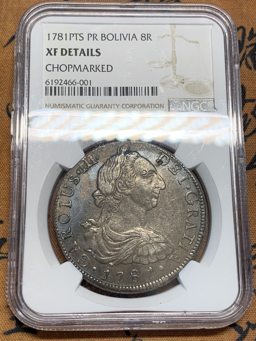 《竞宝斋》第95场-本周日，周一，周四，3场连拍（全场不限金额包邮） NGC XF  玻利维亚 1781年 卡三 8里亚尔 双柱 大银币  双面 深打带包浆 有小戳 味道不错
