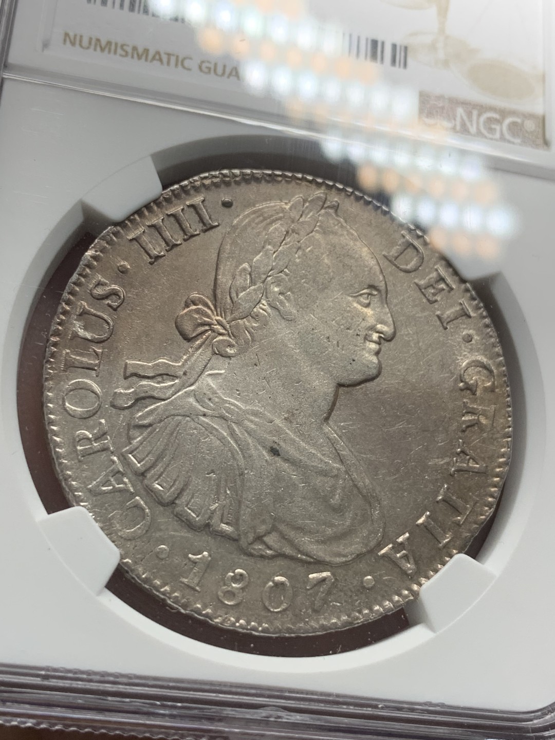 《竞宝斋》第95场-本周日，周一，周四，3场连拍（全场不限金额包邮） NGC AU53 墨西哥 1807年 卡四 8里亚尔 双柱大银币 双面深打 背面PL感底板