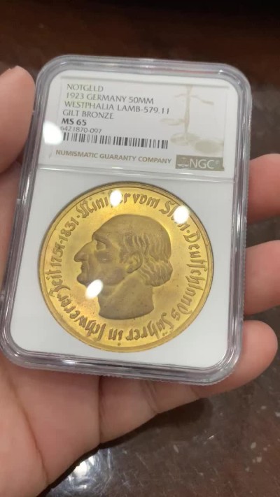 《竞宝斋》第95场-本周日，周一，周四，3场连拍（全场不限金额包邮） NGC-MS65 5000万马克！德国威斯特伐利亚1923年5000万马克马币镀金币，厚重压手，金光闪闪，少见高分！