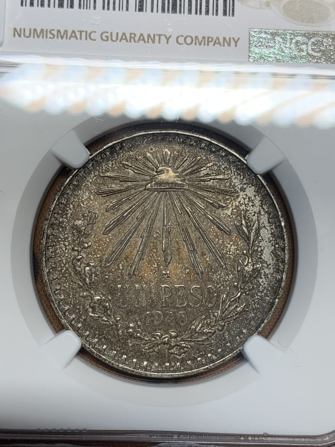 《竞宝斋》第95场-本周日，周一，周四，3场连拍（全场不限金额包邮） NGC-MS63 墨西哥1940年 五彩鹰洋 1比索 银币 这样的包浆能给分真的是太难了