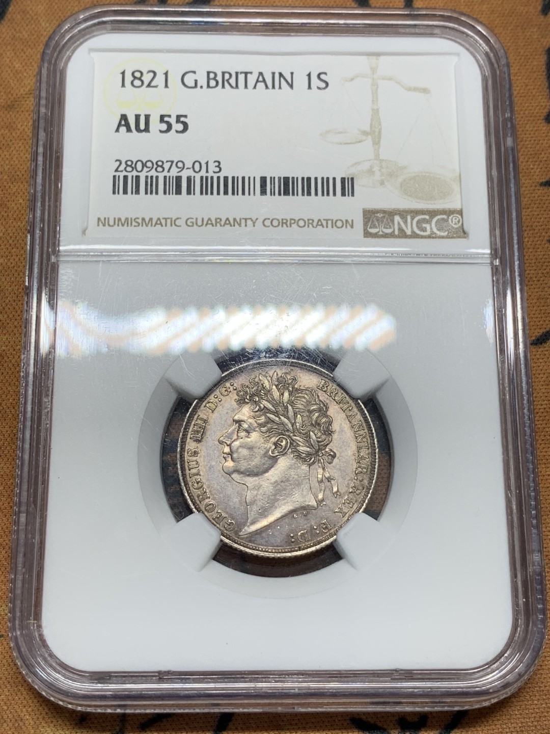 《竞宝斋》第95场-本周日，周一，周四，3场连拍（全场不限金额包邮） NGC-AU55 英国 1821年乔治四世三花版1先令银币 著名单年版本，漂亮的三花。实物转光，状态很好，给分略显保守