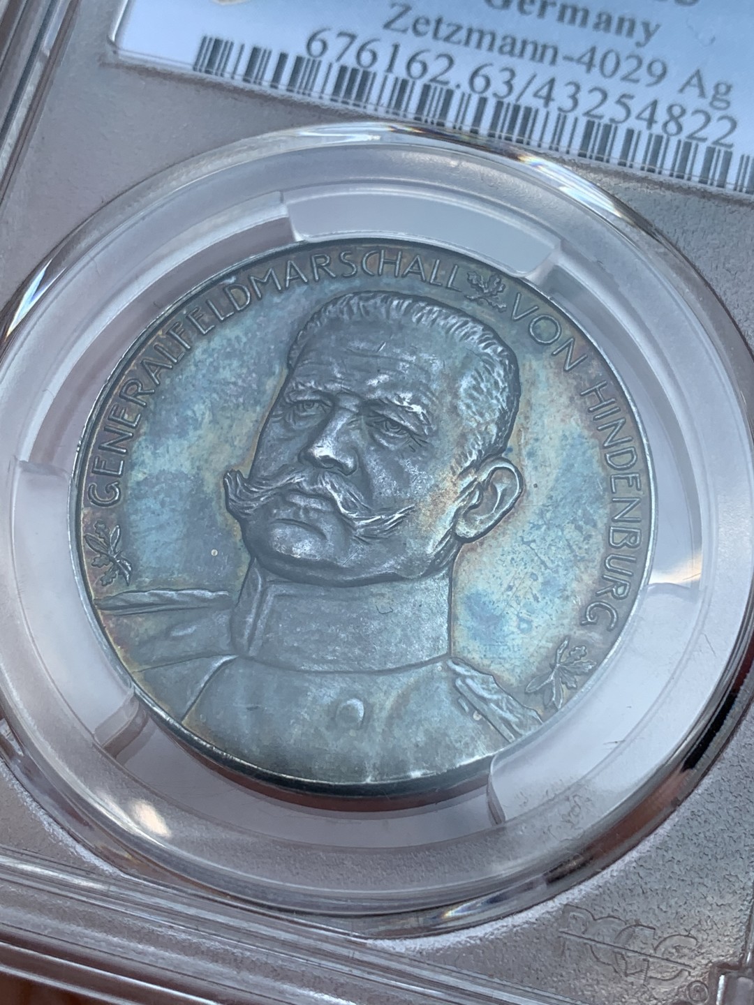 《竞宝斋》第96场-本周日，周一，周四，3场连拍（全场不限金额包邮） PCGS SP63德国1914年兴登堡五彩坦能堡东线战役大胜纪念银章 背面大卫与歌利亚在博弈代表3000年前出自圣经《旧约》中的故事片段，代表弱者完成战胜强者的不可能的奇迹。（P封面第一展示的唯一冠军分）