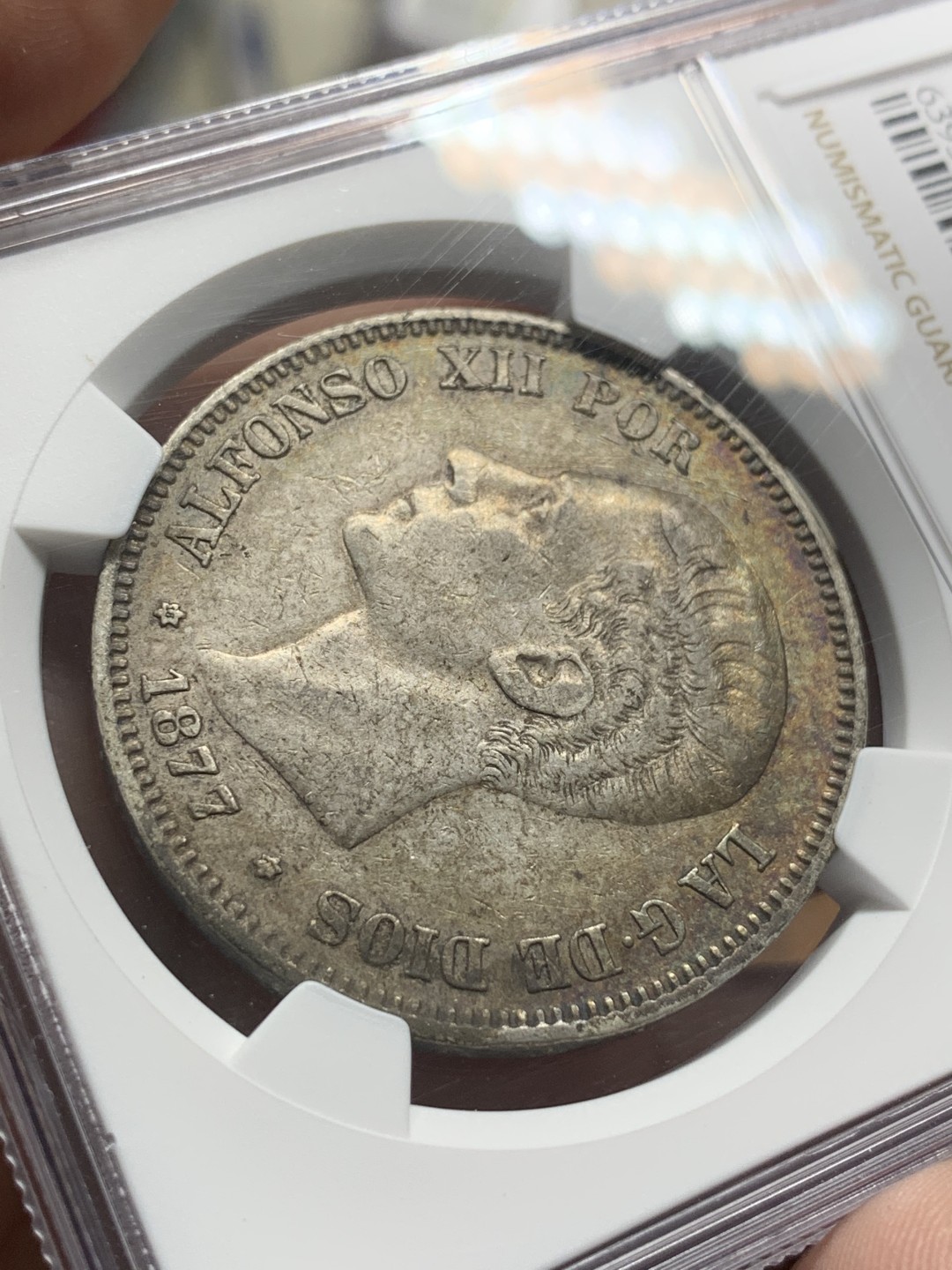 《竞宝斋》第96场-本周日，周一，周四，3场连拍（全场不限金额包邮） NGC-XF45 西班牙1877年 阿方索十二世 5比塞塔双柱 大银币 酱彩 很漂亮