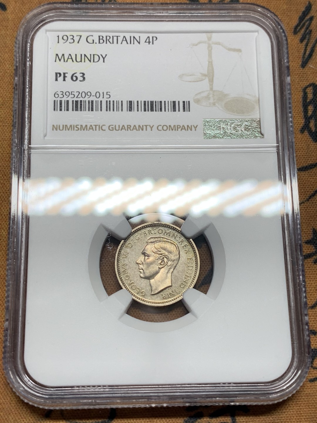 《竞宝斋》第96场-本周日，周一，周四，3场连拍（全场不限金额包邮） NGC-PF63 英国1937年 乔六 4便士 精制PROOF银币