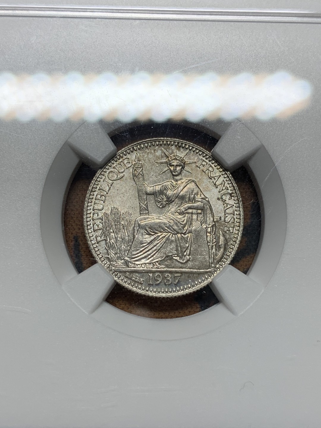 《竞宝斋》第96场-本周日，周一，周四，3场连拍（全场不限金额包邮） 季军分 NGC MS65 法属印度支那1937年10分银币