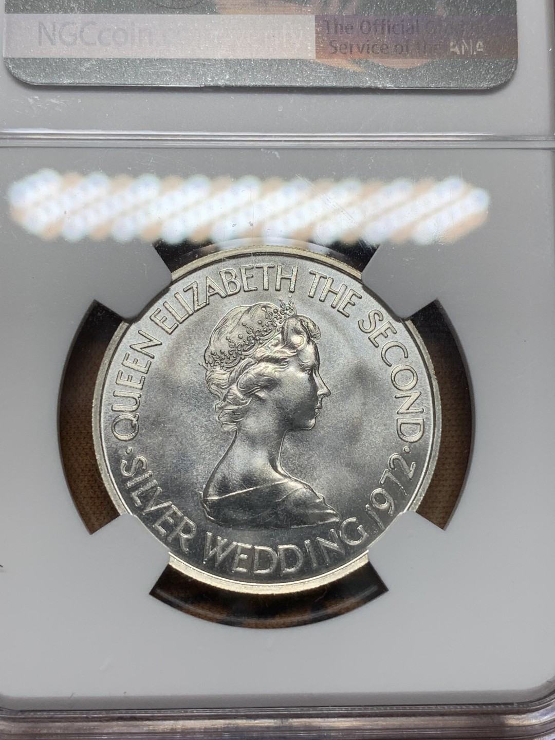 《竞宝斋》第96场-本周日，周一，周四，3场连拍（全场不限金额包邮） NGC MS66 泽西岛1972年 1镑银币 35周年纪念标签