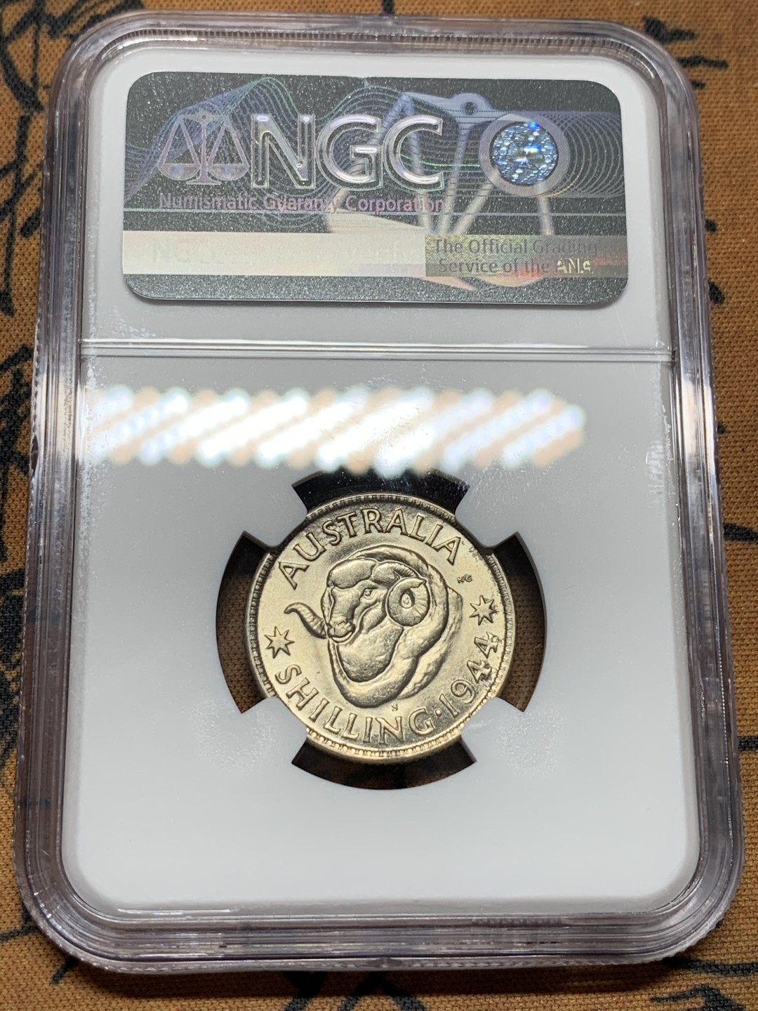 《竞宝斋》第96场-本周日，周一，周四，3场连拍（全场不限金额包邮） NGC MS63 澳大利亚 1944年 乔治六世 绵羊 1先令 银币 暴光状态
