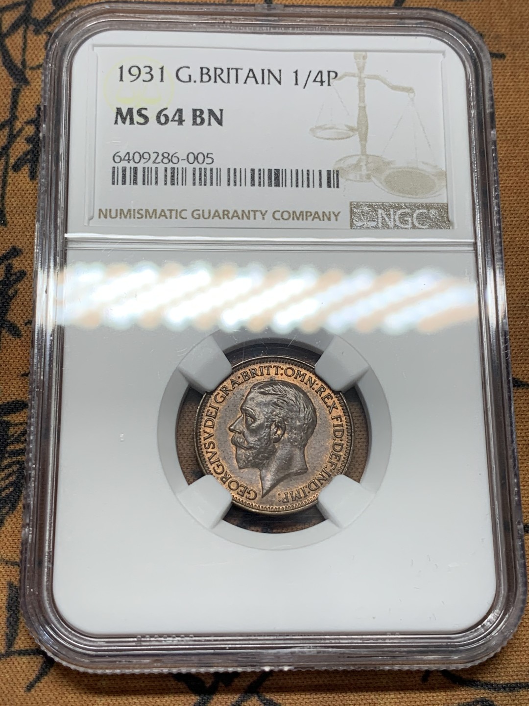 《竞宝斋》第96场-本周日，周一，周四，3场连拍（全场不限金额包邮） NGC MS64BN 英国 1931年 乔治五世 1/4便士=1法新 铜币 深打难得