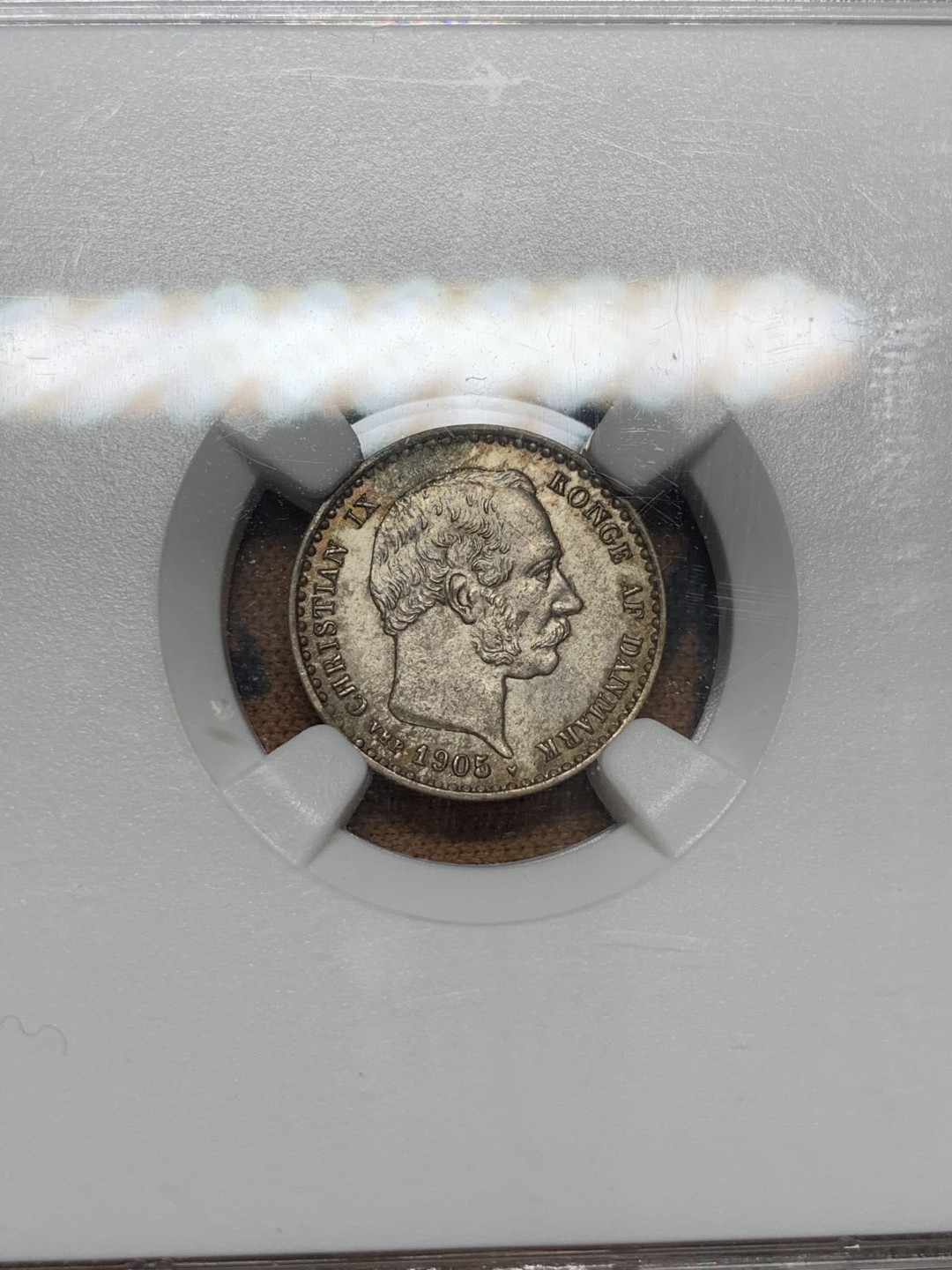 《竞宝斋》第96场-本周日，周一，周四，3场连拍（全场不限金额包邮） NGC MS64 丹麦 1905年 10ORE 银币 双面深彩包浆 细节非常好 海豚灵动