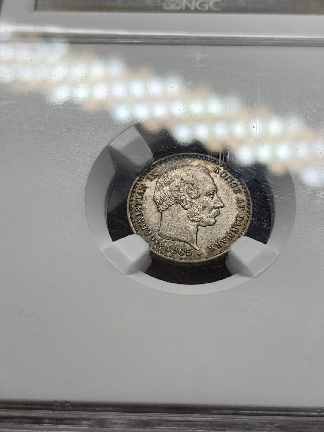 《竞宝斋》第96场-本周日，周一，周四，3场连拍（全场不限金额包邮） NGC MS64 丹麦 1905年 10ORE 银币 双面深彩包浆 细节非常好 海豚灵动