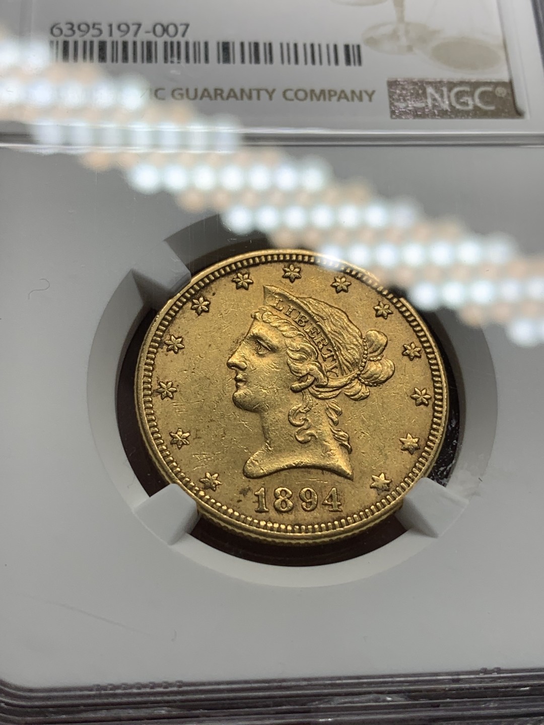 《竞宝斋》第96场-本周日，周一，周四，3场连拍（全场不限金额包邮） NGC-AU55 美国1894年 自由女神像 10美元金币 16.72克 早期年份 好品较少