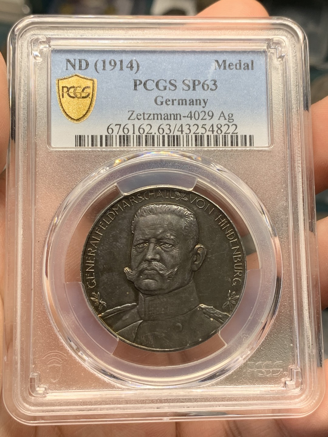 《竞宝斋》第96场-本周日，周一，周四，3场连拍（全场不限金额包邮） PCGS SP63德国1914年兴登堡五彩坦能堡东线战役大胜纪念银章 背面大卫与歌利亚在博弈代表3000年前出自圣经《旧约》中的故事片段，代表弱者完成战胜强者的不可能的奇迹。（P封面第一展示的唯一冠军分）